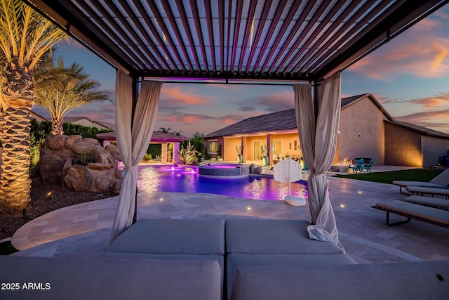 31517 N 41st St, Cave Creek, AZ 85331 - patio terrace at dusk with a pool with connected hot tub and a pergola