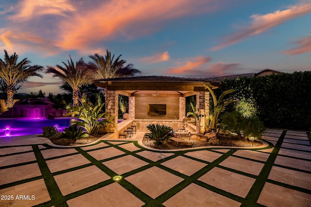 31517 N 41st St, Cave Creek, AZ 85331 - patio terrace at dusk with a swimming pool and a ceiling fan
