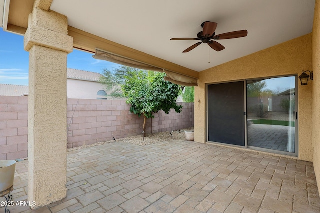 view of patio with ceiling fan