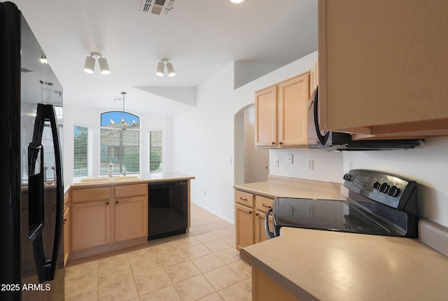 kitchen featuring sink, hanging light fixtures, light tile patterned floors, black appliances, and light brown cabinets