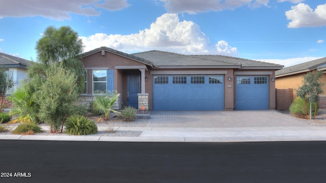 view of front of home with a garage