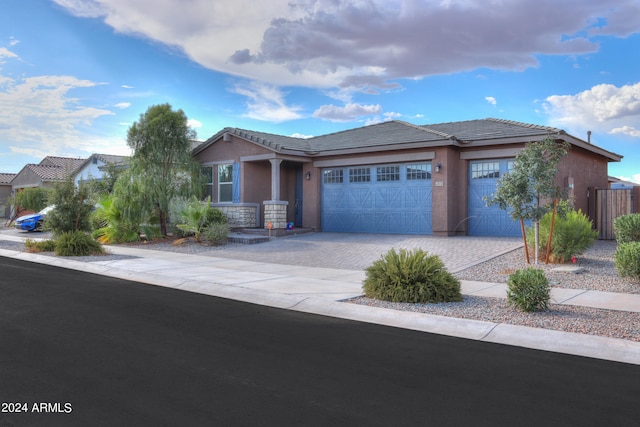 view of front of home with a garage