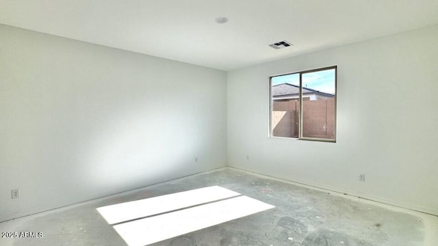 empty room featuring concrete floors