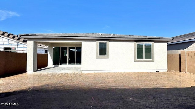 back of house featuring a patio area