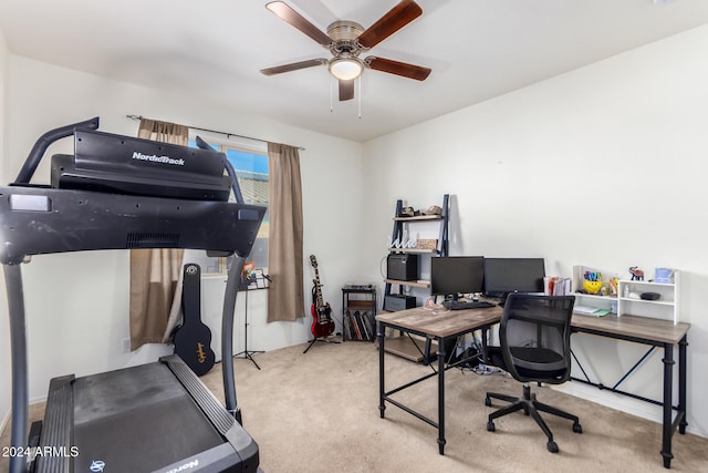 office area featuring ceiling fan and light colored carpet