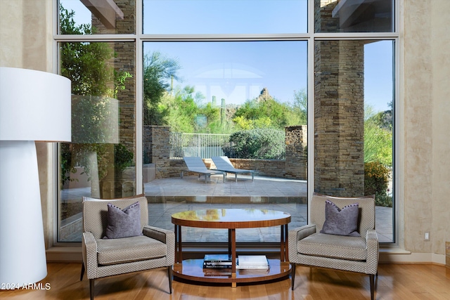 sitting room with hardwood / wood-style floors