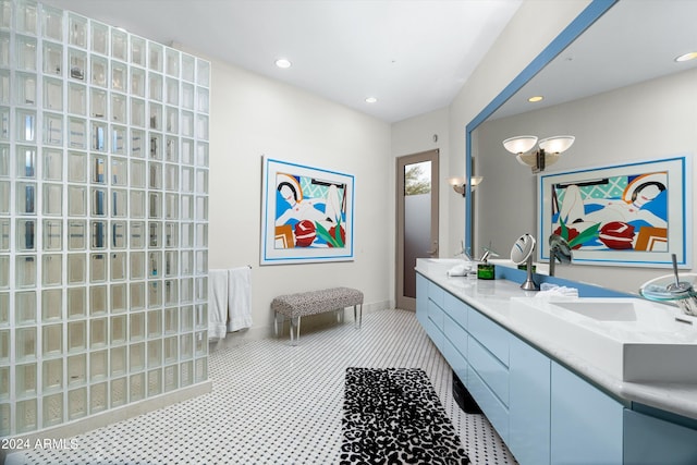 bathroom featuring dual bowl vanity and tile flooring