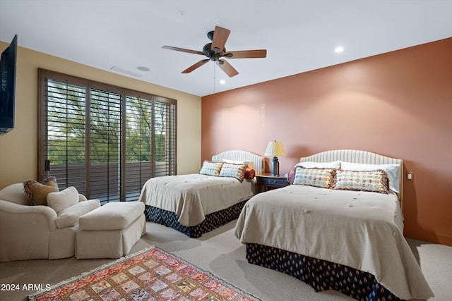 bedroom featuring ceiling fan and carpet flooring