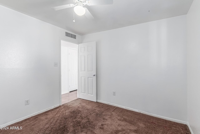 unfurnished room featuring carpet flooring and ceiling fan