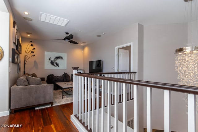 hallway with dark hardwood / wood-style floors