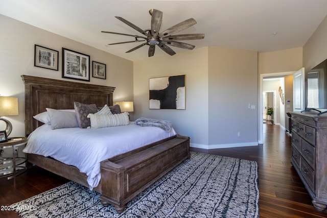 bedroom featuring dark hardwood / wood-style flooring and ceiling fan