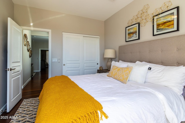 bedroom with dark wood-type flooring