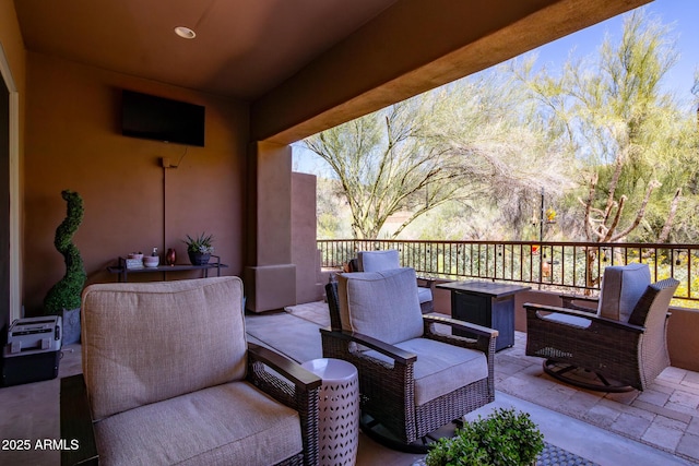 view of patio with a balcony