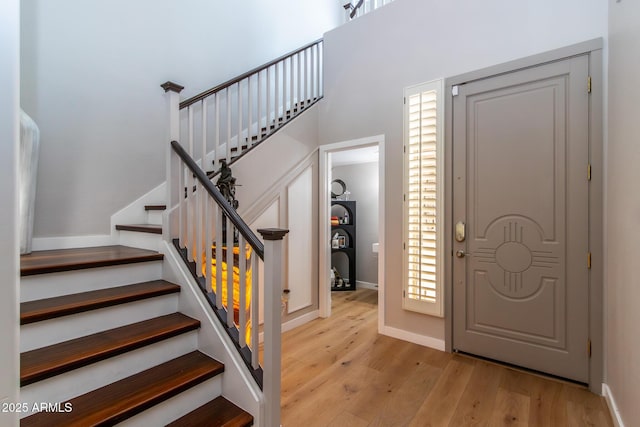 entrance foyer with plenty of natural light and light wood-type flooring