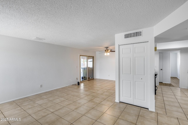 5504 N 69th Ave, Glendale, AZ 85303 - unfurnished room featuring a textured ceiling, a ceiling fan, and light tile patterned floors