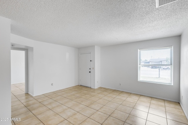5504 N 69th Ave, Glendale, AZ 85303 - unfurnished room featuring a textured ceiling