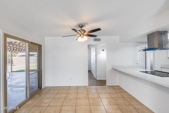 5504 N 69th Ave, Glendale, AZ 85303 - unfurnished living room featuring ceiling fan and a textured ceiling