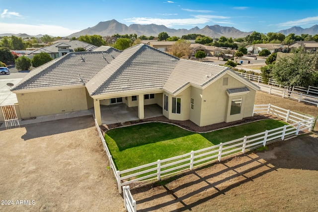 birds eye view of property featuring a mountain view