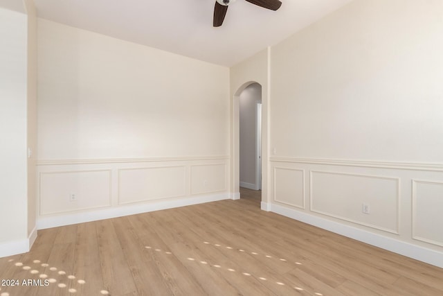 unfurnished room featuring ceiling fan and light wood-type flooring