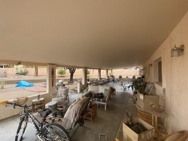 view of patio / terrace with outdoor dining area and fence