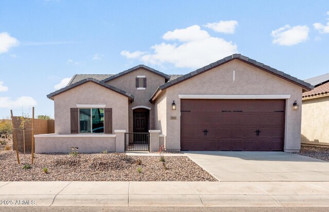 view of front of property with a garage