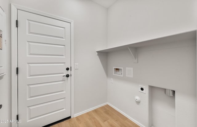 washroom featuring laundry area, baseboards, hookup for a washing machine, hookup for an electric dryer, and light wood-style floors