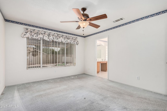 3349 E Lavey Ln, Phoenix, AZ 85032 - unfurnished room featuring plenty of natural light, carpet flooring, visible vents, and ceiling fan