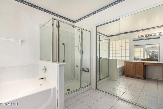 3349 E Lavey Ln, Phoenix, AZ 85032 - bathroom featuring tile patterned flooring, a stall shower, and a garden tub
