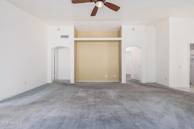 3349 E Lavey Ln, Phoenix, AZ 85032 - carpeted spare room featuring arched walkways, visible vents, and a ceiling fan