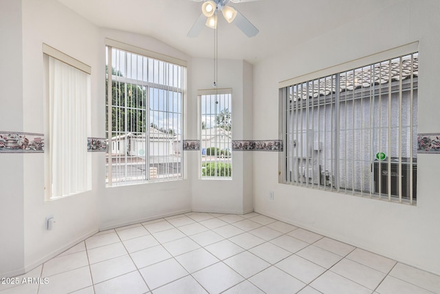 3349 E Lavey Ln, Phoenix, AZ 85032 - tiled empty room featuring ceiling fan and vaulted ceiling