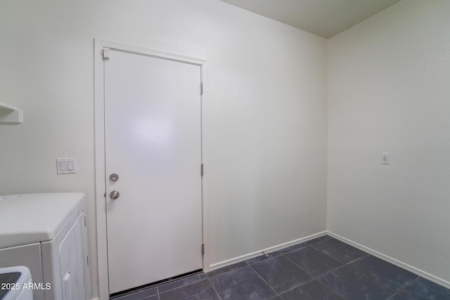 laundry room with washing machine and clothes dryer