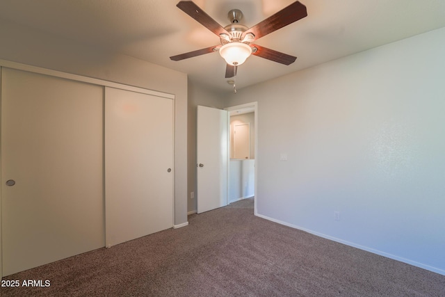 unfurnished bedroom with carpet floors, a closet, and ceiling fan