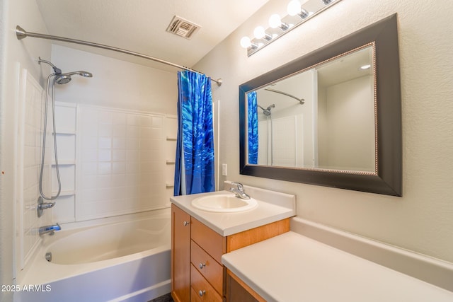 bathroom featuring vanity and shower / bath combination with curtain