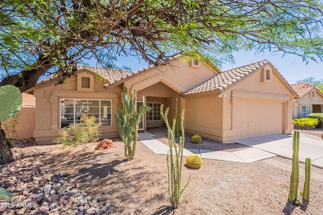 4037 E Milton Dr, Cave Creek, AZ 85331 - view of front facade with a garage, stucco siding, a tile roof, and driveway