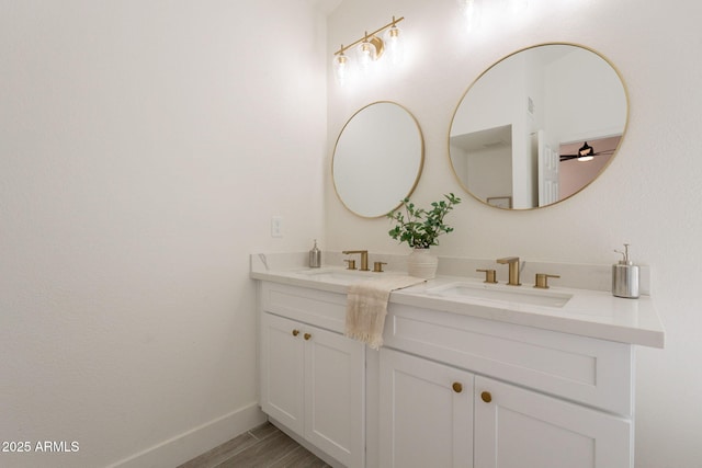 4037 E Milton Dr, Cave Creek, AZ 85331 - bathroom with double vanity and wood finished floors