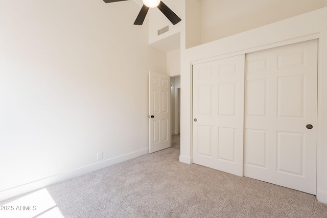 4037 E Milton Dr, Cave Creek, AZ 85331 - unfurnished bedroom with carpet, a towering ceiling, a closet, and ceiling fan