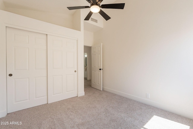 4037 E Milton Dr, Cave Creek, AZ 85331 - unfurnished bedroom featuring carpet floors, a closet, vaulted ceiling, and a ceiling fan