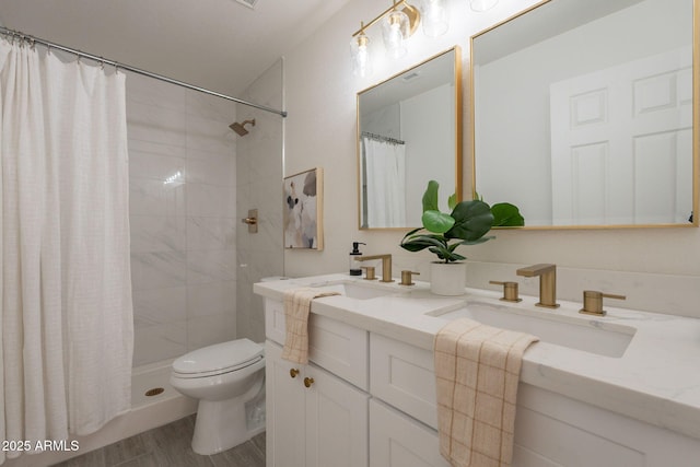 4037 E Milton Dr, Cave Creek, AZ 85331 - full bathroom featuring double vanity, tiled shower, and wood finished floors