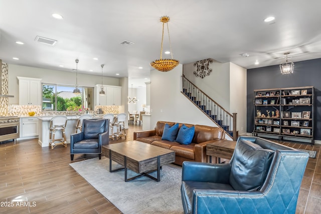 625 W Echo Ln, Phoenix, AZ 85021 - living area featuring recessed lighting, stairs, visible vents, and wood finished floors