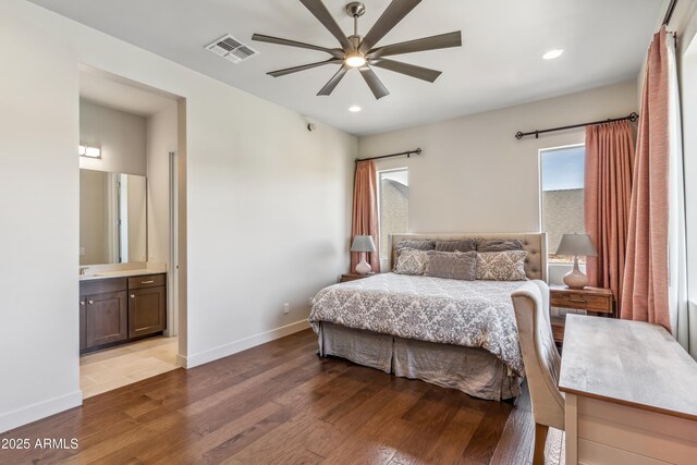 625 W Echo Ln, Phoenix, AZ 85021 - bedroom with recessed lighting, ensuite bath, visible vents, baseboards, and hardwood / wood-style flooring