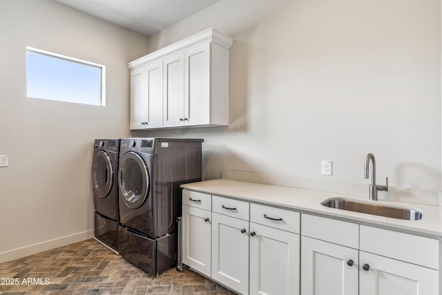 625 W Echo Ln, Phoenix, AZ 85021 - washroom with washing machine and clothes dryer, cabinet space, baseboards, and a sink