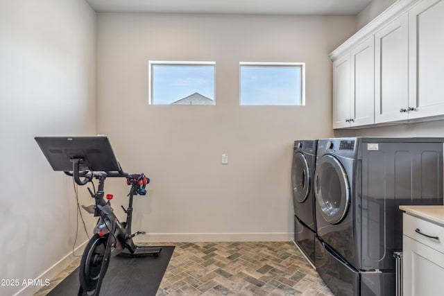 625 W Echo Ln, Phoenix, AZ 85021 - laundry room with baseboards, a wealth of natural light, cabinet space, and washer and clothes dryer
