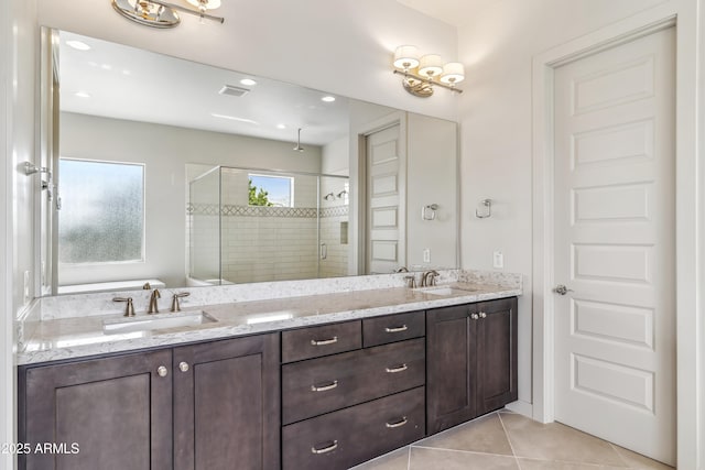 625 W Echo Ln, Phoenix, AZ 85021 - full bath with a sink, a shower stall, double vanity, visible vents, and tile patterned flooring