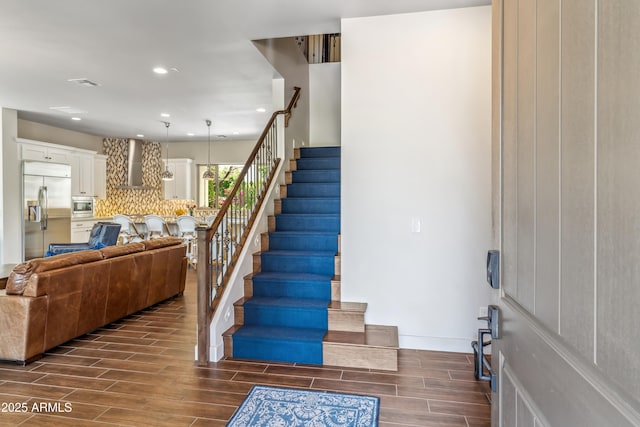625 W Echo Ln, Phoenix, AZ 85021 - staircase with wood finished floors, recessed lighting, and baseboards