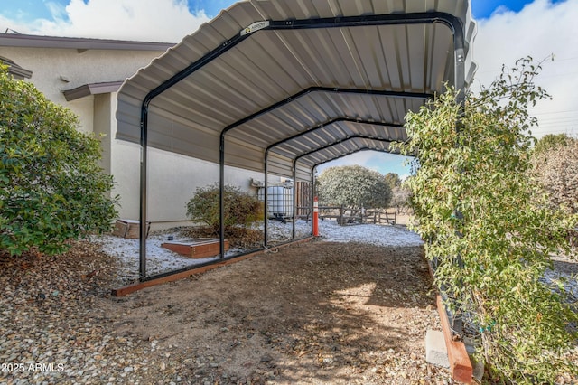 view of car parking featuring a carport