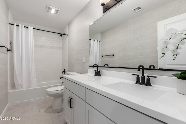 8640 W Frier Dr, Glendale, AZ 85305 - full bath featuring toilet, shower / bath combination with curtain, double vanity, and tile patterned flooring