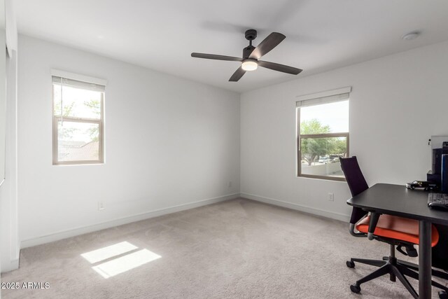8640 W Frier Dr, Glendale, AZ 85305 - unfurnished office with plenty of natural light, carpet flooring, and baseboards