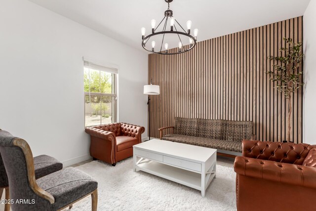 8640 W Frier Dr, Glendale, AZ 85305 - living room featuring a chandelier and baseboards