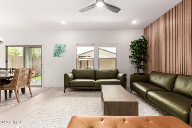 8640 W Frier Dr, Glendale, AZ 85305 - living room with ceiling fan, light wood finished floors, recessed lighting, and baseboards
