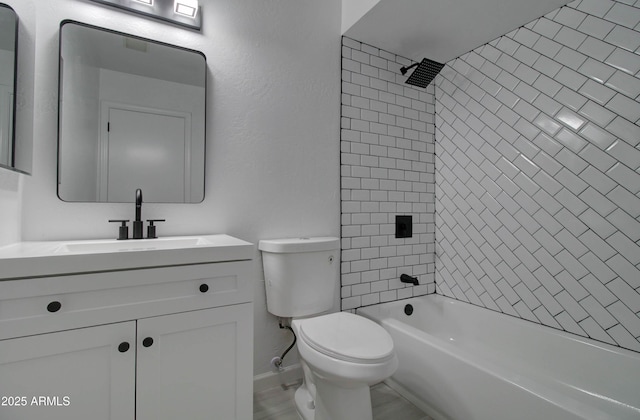 full bathroom featuring toilet, baseboards, shower / washtub combination, and vanity